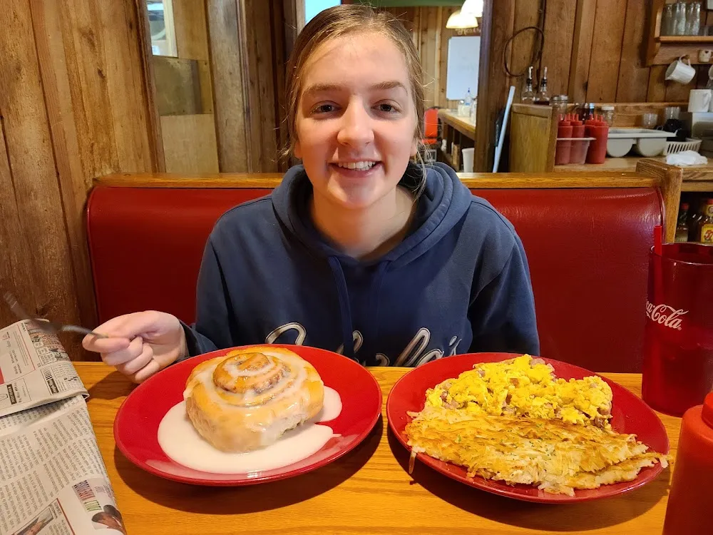 Eggs Hashbrowns Cinnamon Roll